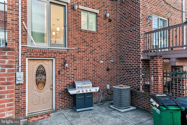 property entrance with central air condition unit