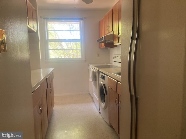 kitchen with ceiling fan, washing machine and dryer, and white appliances