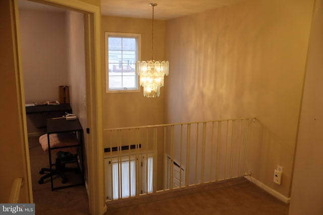 interior space with carpet and an inviting chandelier