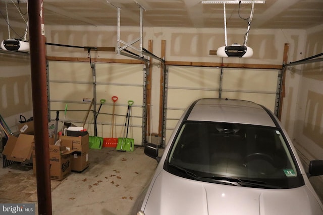 garage featuring a garage door opener