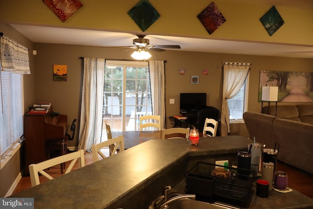 dining room featuring ceiling fan