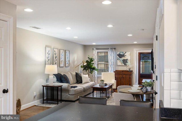 living room with hardwood / wood-style flooring