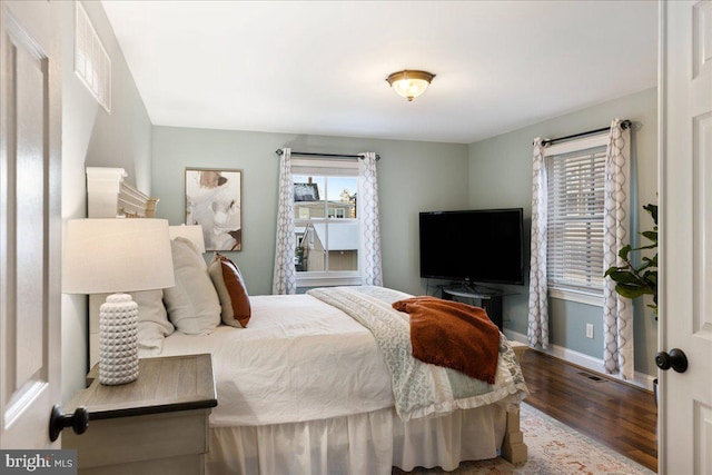 bedroom featuring wood-type flooring