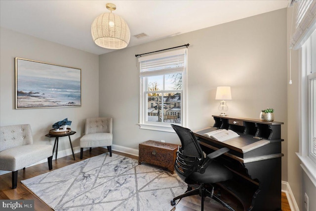 home office featuring hardwood / wood-style floors