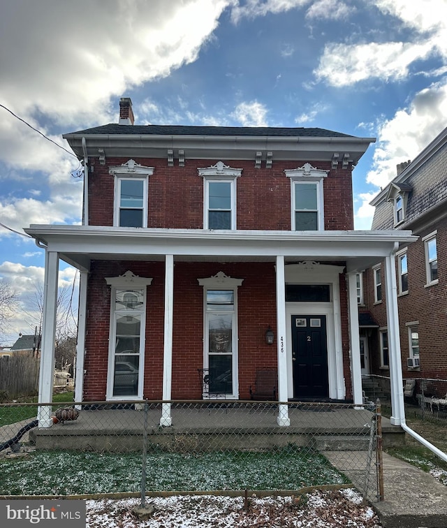 view of italianate home