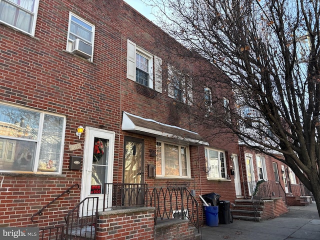 view of building exterior featuring cooling unit