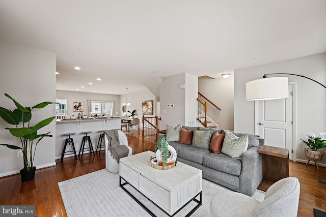 living room with dark hardwood / wood-style floors