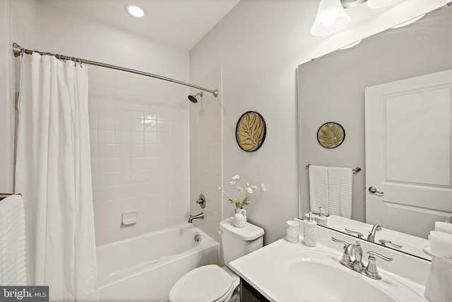 full bathroom with vanity, toilet, and shower / bathtub combination with curtain