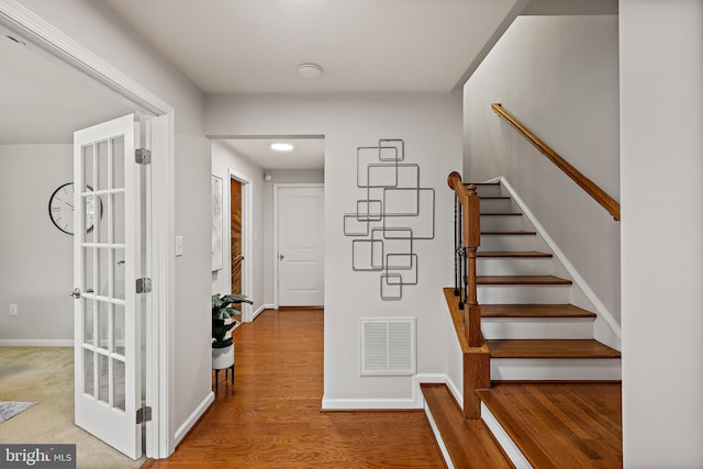 interior space with hardwood / wood-style floors