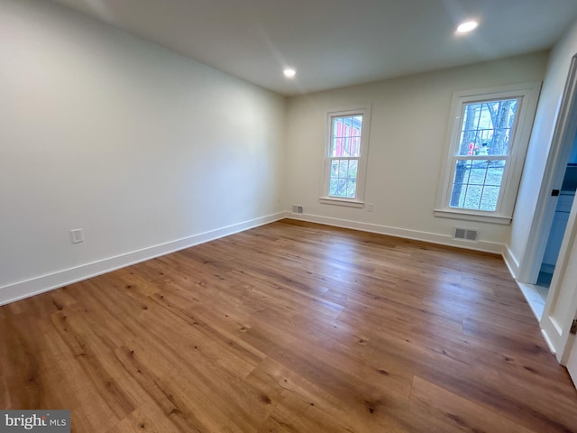 empty room with light wood-type flooring