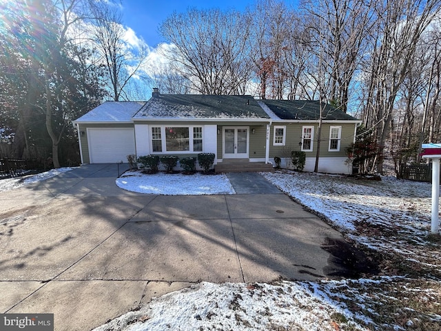 single story home with a garage