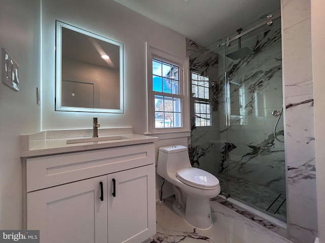 bathroom with vanity, toilet, and walk in shower