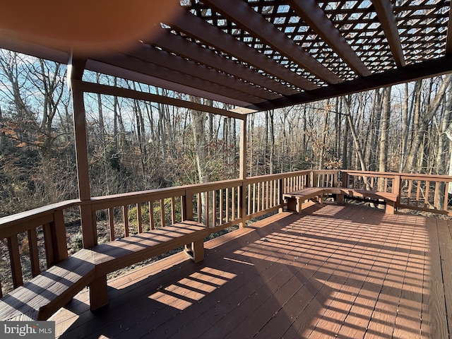 wooden deck with a pergola