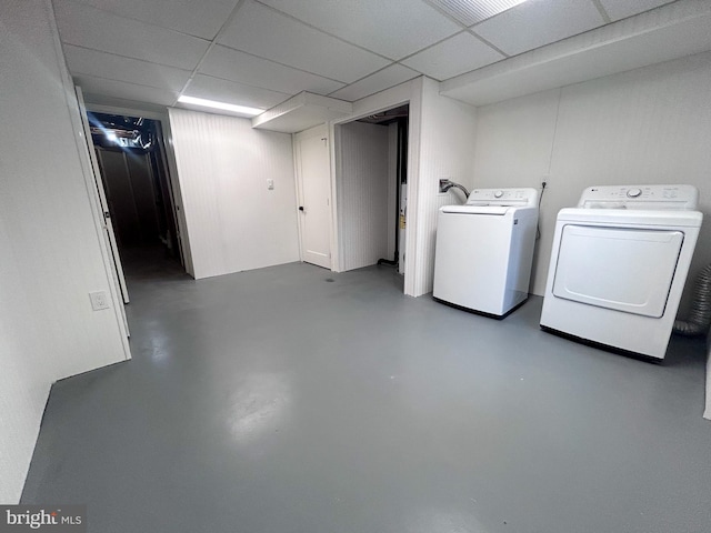 laundry room featuring washing machine and clothes dryer