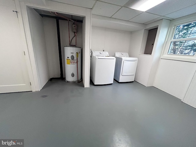 laundry area featuring washer and dryer and electric water heater