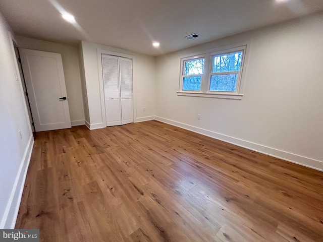 unfurnished bedroom featuring light hardwood / wood-style flooring