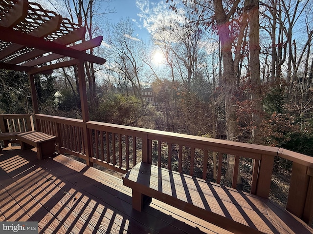 wooden deck with a pergola