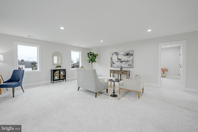 interior space with baseboards and recessed lighting