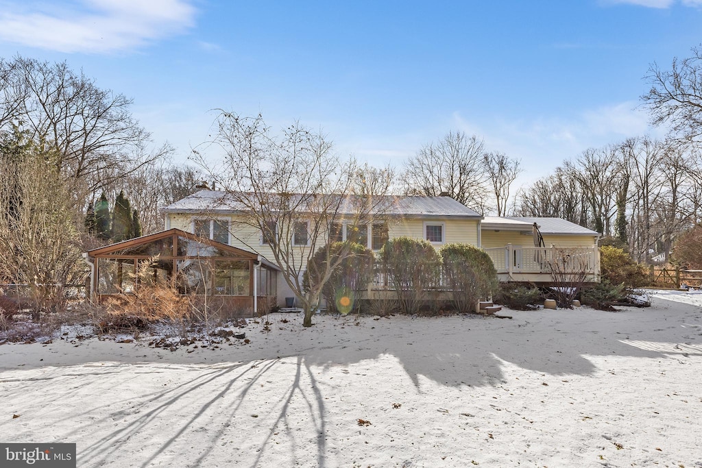 view of front of house with a wooden deck