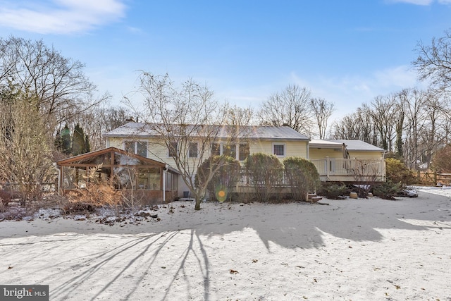 view of front of house with a wooden deck