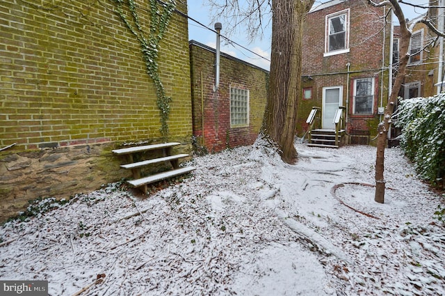 view of yard covered in snow