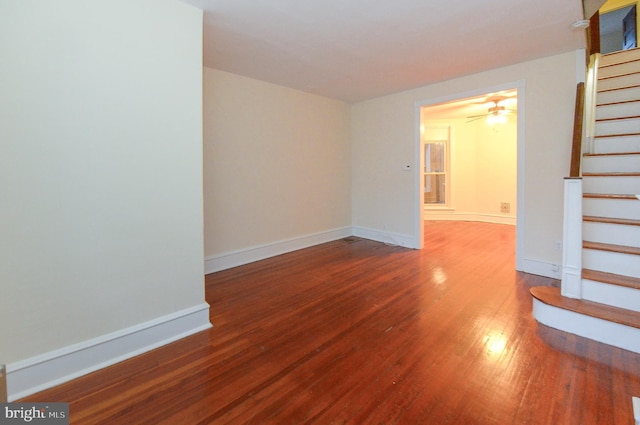 spare room featuring ceiling fan and wood-type flooring