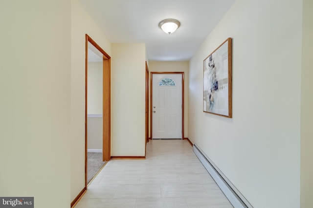 hallway featuring a baseboard heating unit