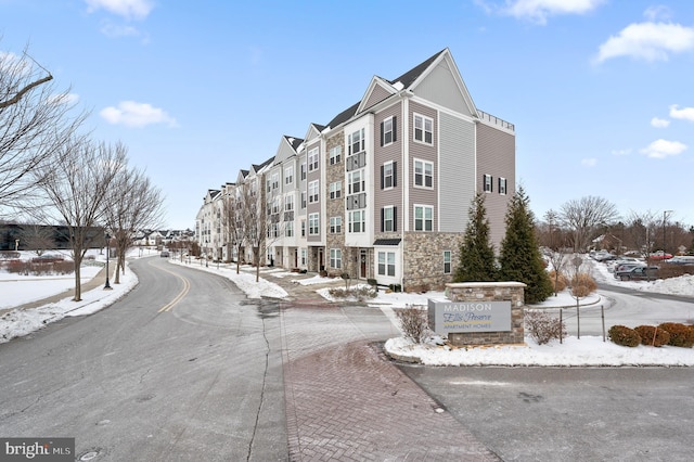 view of snow covered property