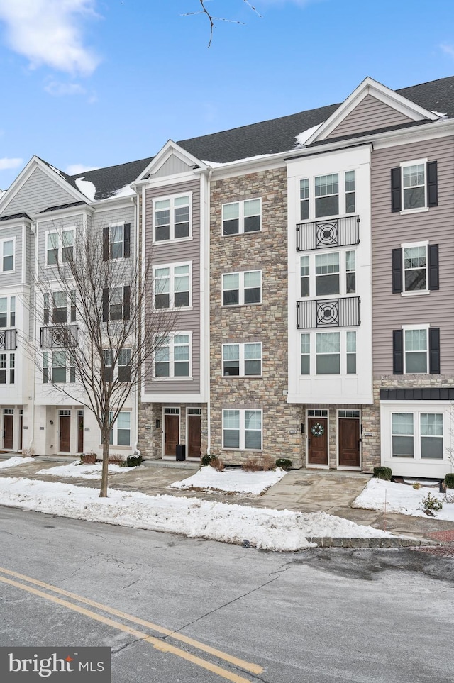 view of snow covered property