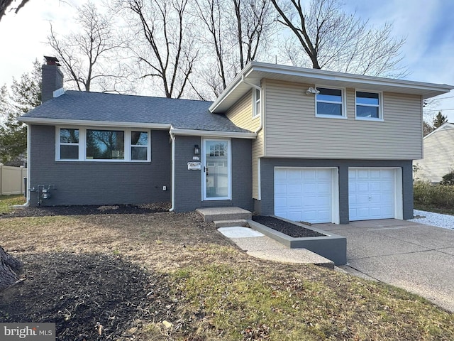 split level home with a garage