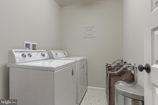 laundry area featuring washing machine and dryer