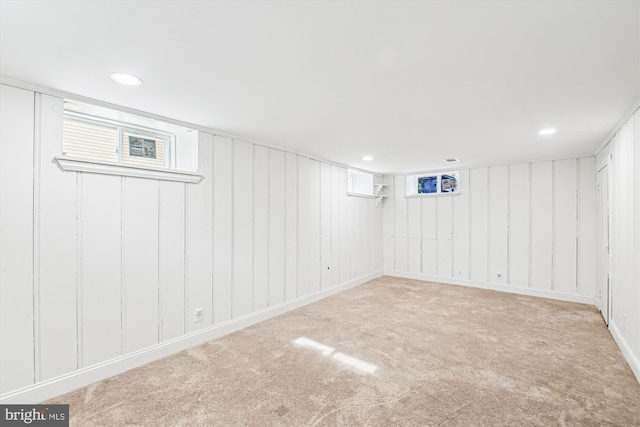 basement with light carpet