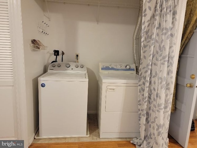 laundry area featuring separate washer and dryer