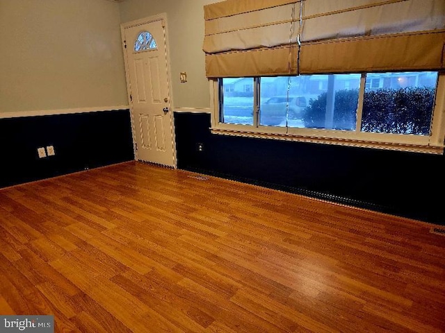 spare room featuring hardwood / wood-style floors