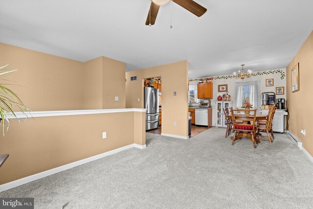 1025 Harmony Hl, Lebanon, PA 17046 - dining area with visible vents, ceiling fan with notable chandelier, baseboards, and light carpet