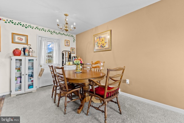 1025 Harmony Hl, Lebanon, PA 17046 - dining space featuring baseboards, carpet floors, and an inviting chandelier