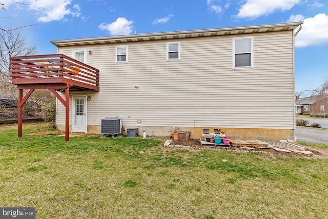 1025 Harmony Hl, Lebanon, PA 17046 - back of house with central air condition unit, a lawn, and a deck