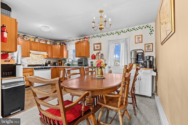 1025 Harmony Hl, Lebanon, PA 17046 - dining room featuring baseboards and a notable chandelier