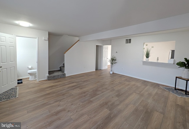 living room with wood-type flooring