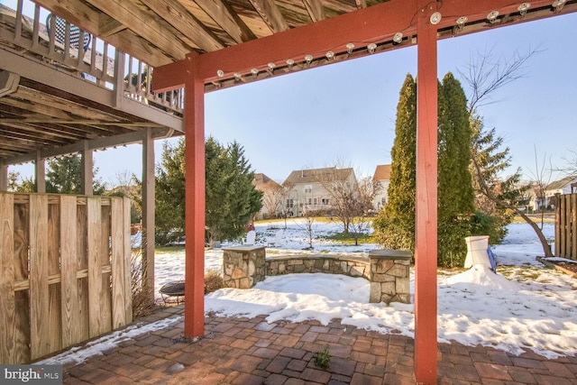 view of snow covered patio