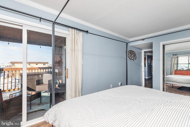 bedroom featuring access to outside, ornamental molding, and a textured ceiling