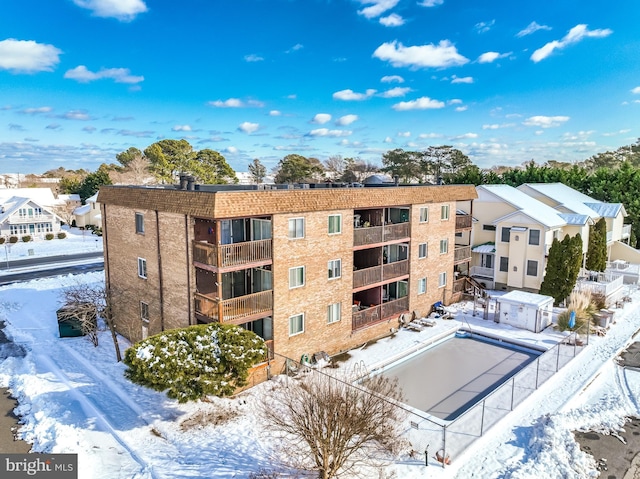 view of snow covered building