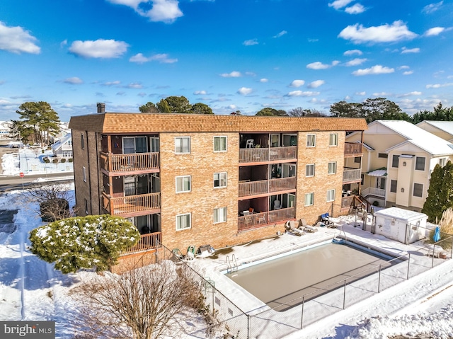 view of snow covered property