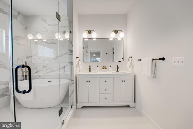 bathroom featuring vanity and a washtub