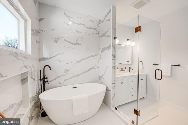 bathroom featuring vanity and plus walk in shower