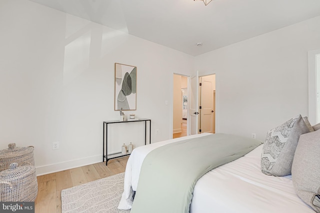 bedroom featuring light hardwood / wood-style floors