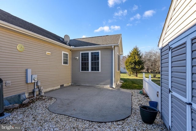 back of house with a patio area