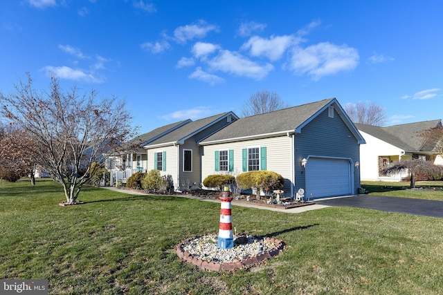 single story home featuring a garage and a front yard