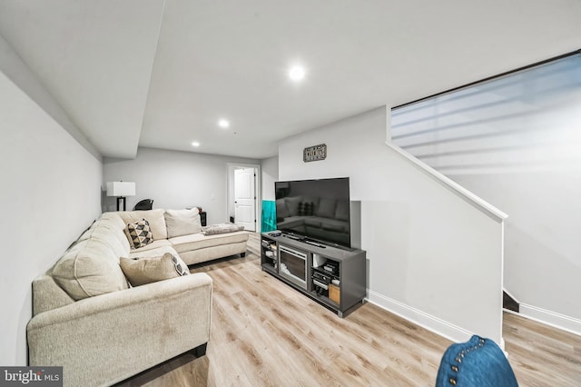 living room featuring light wood-type flooring