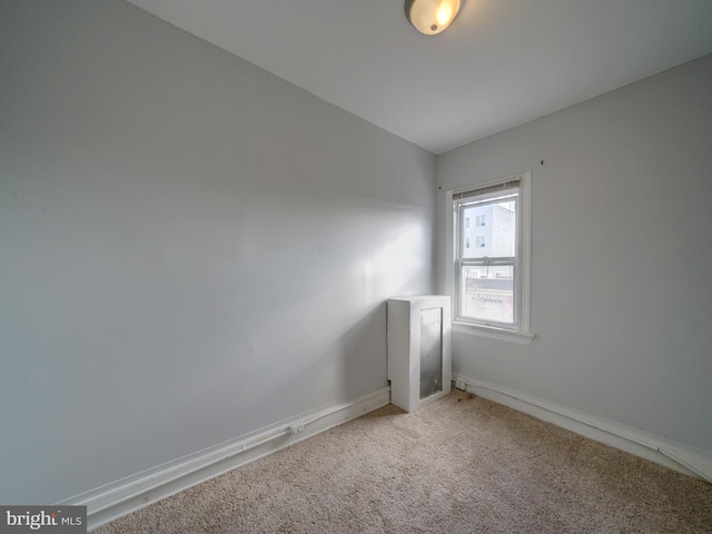 empty room with carpet flooring